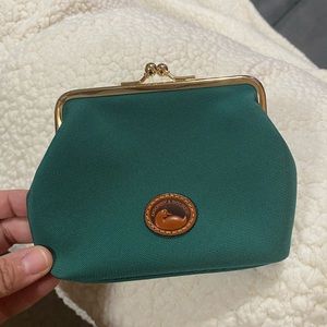 Dooney & Bourke used kisslock framed purse.